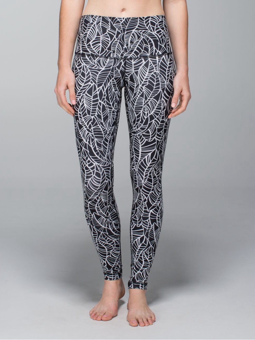lululemon athletica Wunder Under leggings in the "Pretty Palm Black Angel Wing"